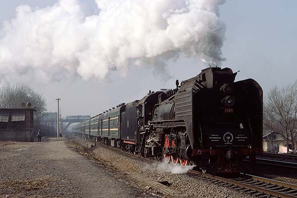 Chinese Railways RM class 4-6-2 1199 with passenger train at Jinan