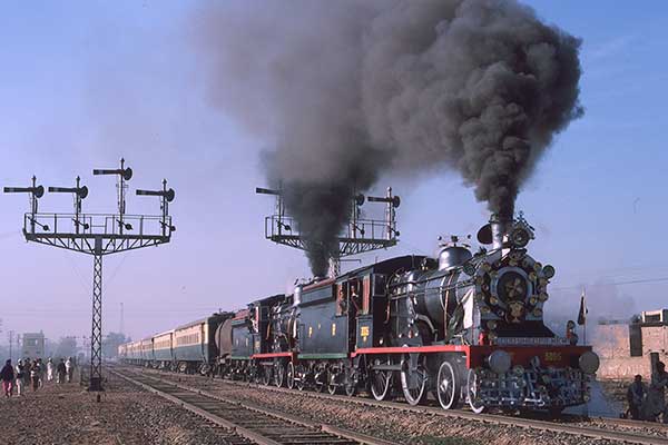 Pakistan Railways SPS class 4-4-0's 3005 and 2973 leaving Faisalabad